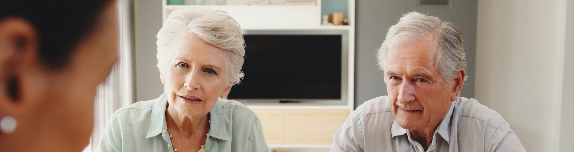 Elderly couple in finance or financial meeting